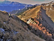 55 In ripida discesa con attenzione dalla vetta del Pizzo Badile  (2044 m) con vista sul Monte Secco  (2293 m) 